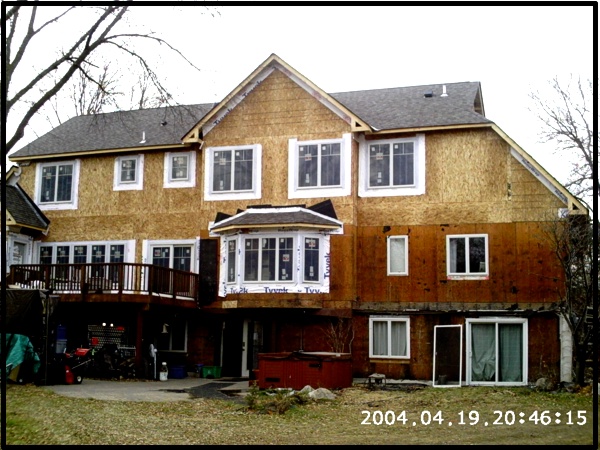 Back exterior with windows and deck